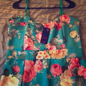 Never worn FashionMark dress. New without tags.